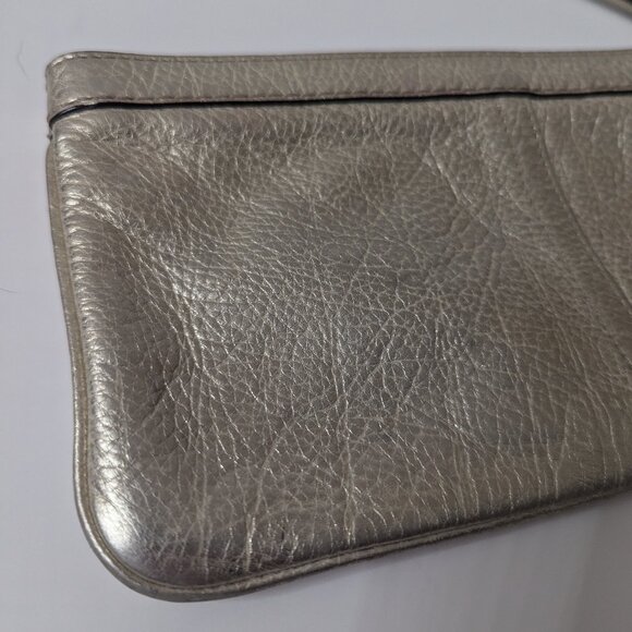 Like new Coach Metallic Champagne Gold Wristlet Clutch - Picture 6 of 16